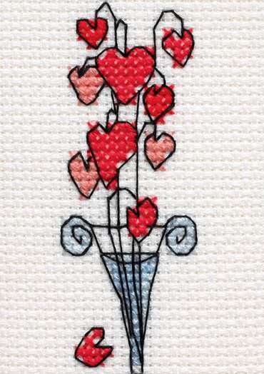 Hearts in Tall Glass Vase